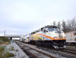 MP36PH-Q # 105 pushes the Sunrail train away from Sand Lake Road Station, enroute from Deland to Poinciana.